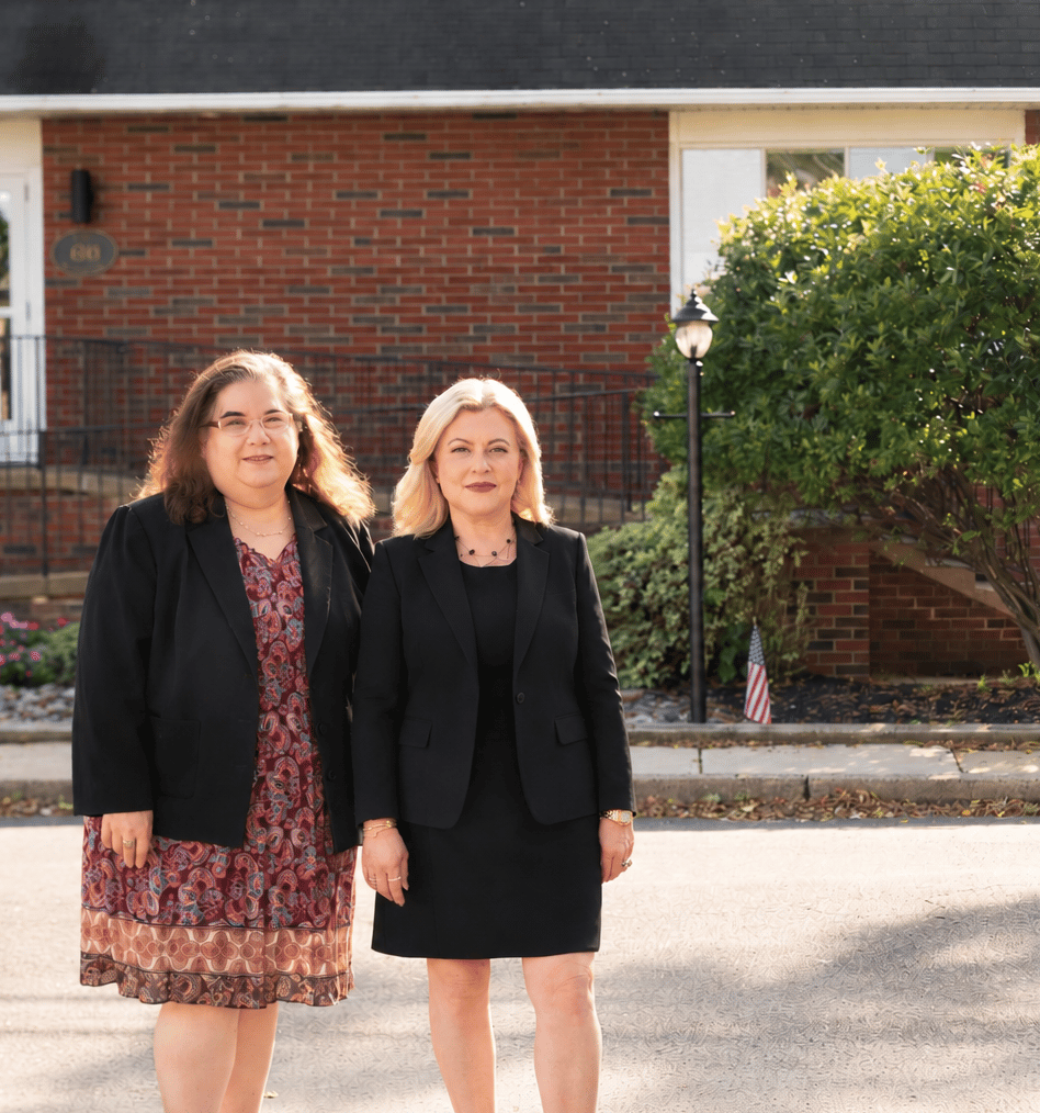 Attorneys Iriana Blitshtein and Tova Weiss standing outside the Blitshtein & Weiss law office